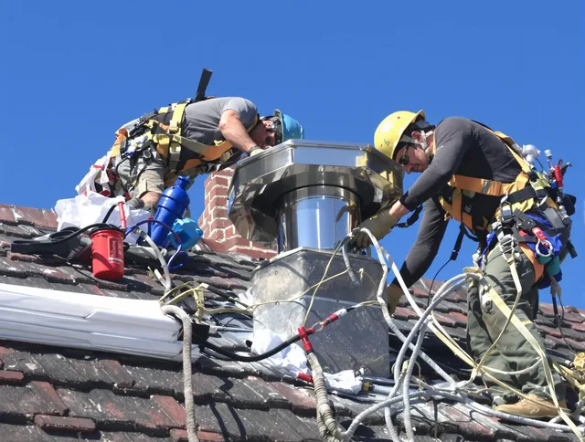 Protective chimney cap installed by Groton Chimney Sweep in Groton, CT