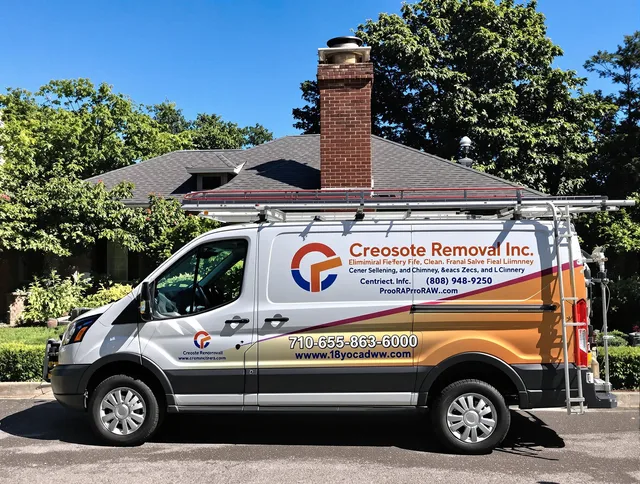 Groton Chimney Sweep technician removing creosote safely in Groton, CT